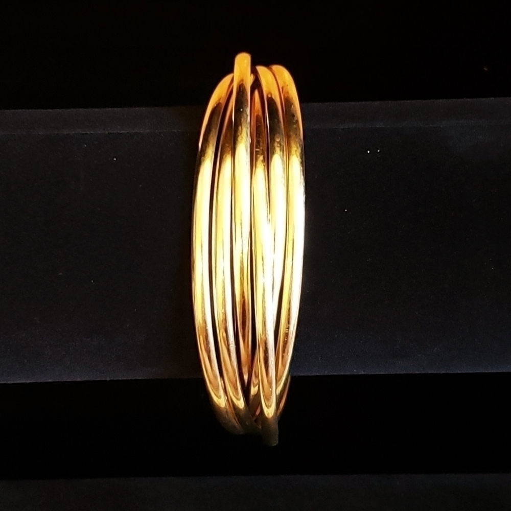 6 Interlocking Gold Tone Bracelets - image 1